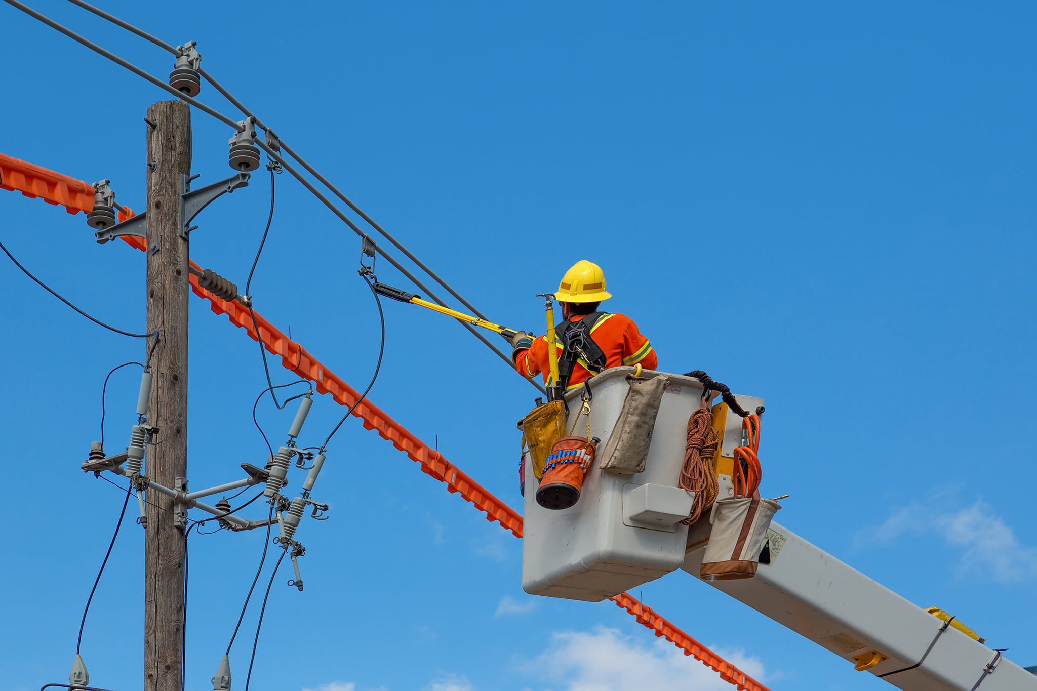 Lineman working on utility line